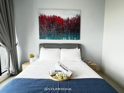 a bed with a bowl of food on top of it at D'pristine by Antlerzone in Johor Bahru