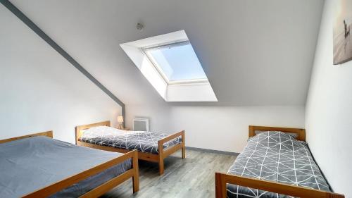Posteľ alebo postele v izbe v ubytovaní Appartement 3 pièces 5 à 6 personnes - vue mer - à 200 m de la plage - FANTA