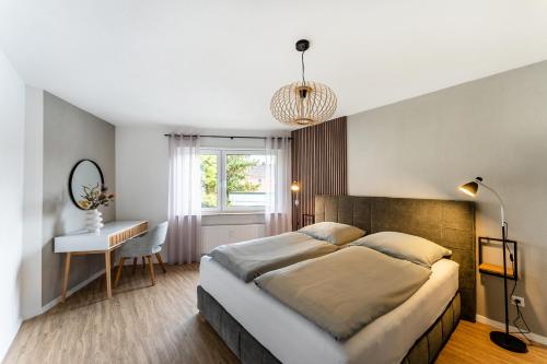 En eller flere senge i et værelse på Juri/4 Bad Dürrheim