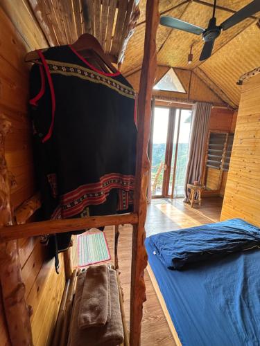 Postel nebo postele na pokoji v ubytování Tà Đùng May Farm