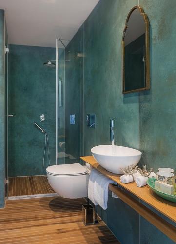 a bathroom with a sink and a shower at A23 Boutique Hotel in Tel Aviv