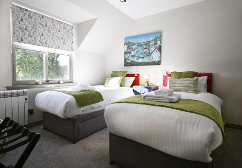 Postel nebo postele na pokoji v ubytování Taigh Corpach