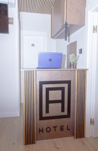 a hotel desk with a laptop on top of it at A Heritage Split in Split