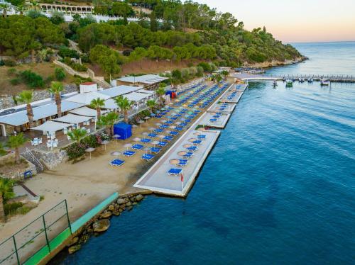 an aerial view of a beach with chairs and umbrellas at Labranda Ephesus Princess - All Inclusive in Kusadası