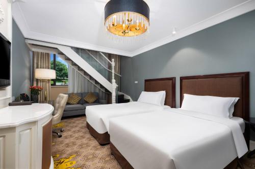 Katil atau katil-katil dalam bilik di Crowne Plaza Zhengzhou by IHG