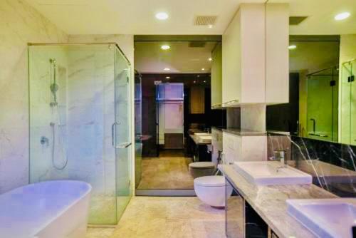 a bathroom with two sinks and a shower at amazing suites at platinum suites in Kuala Lumpur