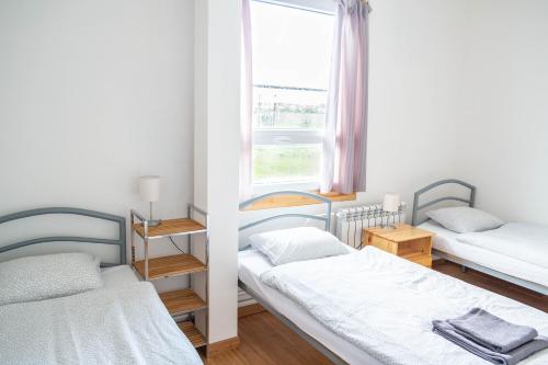 Postel nebo postele na pokoji v ubytování Penzion Starý dvůr