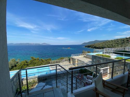 a view of the ocean from the balcony of a house at Villa Seaview in Pteleós