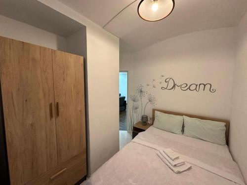 Postel nebo postele na pokoji v ubytování Guest House Central