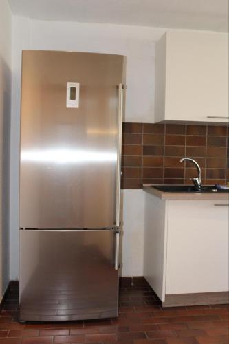 Η κουζίνα ή μικρή κουζίνα στο Mont Apartments