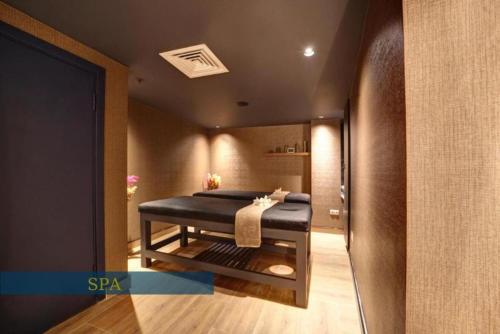 a spa room with a bed in the corner at Concept Nisantasi Hotels & Spa in Istanbul