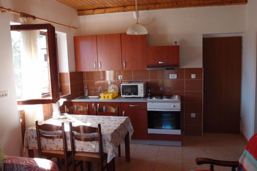 Kuchyň nebo kuchyňský kout v ubytování Villa Lina