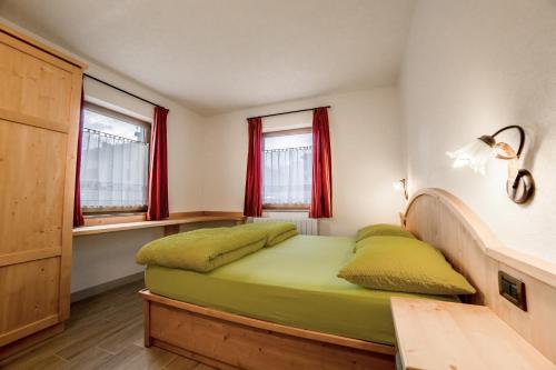 Säng eller sängar i ett rum på Chalet Alpine Dream