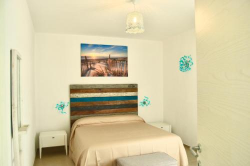 Postel nebo postele na pokoji v ubytování L' Alba del Salento