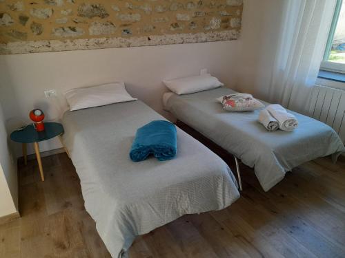 Ein Bett oder Betten in einem Zimmer der Unterkunft Il Giardino di Marzo Guest House