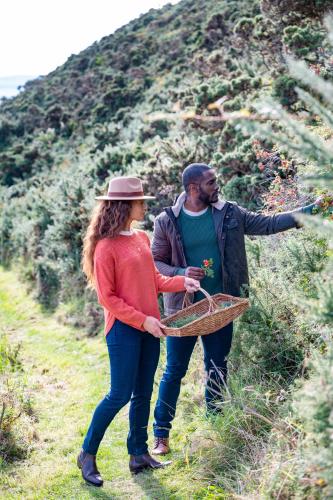 a man and a woman standing on a hill at The Glenmorangie House in Tain