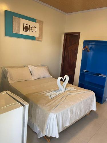Ένα ή περισσότερα κρεβάτια σε δωμάτιο στο Atalaia VIP Praia Hotel