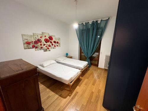 A bed or beds in a room at Giuse