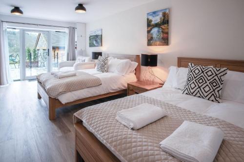 Katil atau katil-katil dalam bilik di Suite 3 - Sleeping Giant Hotel - Pen Y Cae Inn