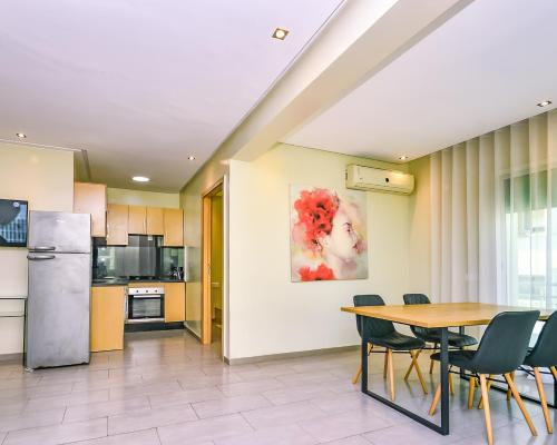 Kuchyň nebo kuchyňský kout v ubytování Cozy Central - Gym & Spa Srvcs