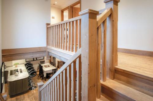 an overhead view of a staircase in a house at Oak Lodge - The Sleeping Giant - Pen Y Cae Inn in Brecon