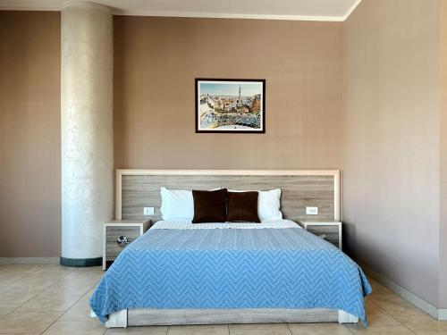 Posteľ alebo postele v izbe v ubytovaní Hotel Tirana