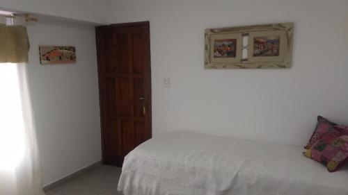 Кровать или кровати в номере Departamento Mitre