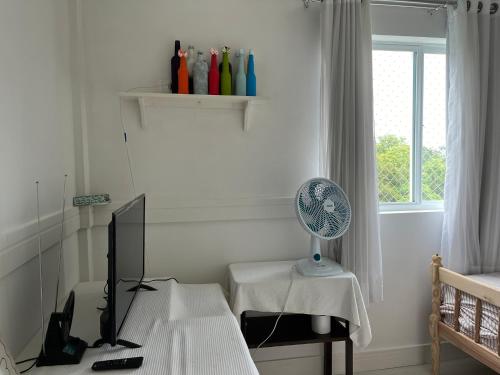 Postel nebo postele na pokoji v ubytování Suítes e quartos no Centro de Blumenau