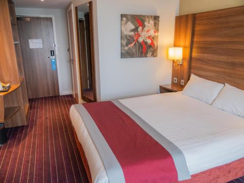 Ein Bett oder Betten in einem Zimmer der Unterkunft Days Inn Wetherby