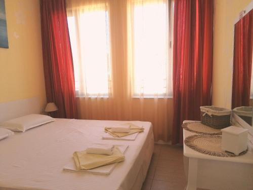 Postel nebo postele na pokoji v ubytování Apartment White dolphin GreeenLife