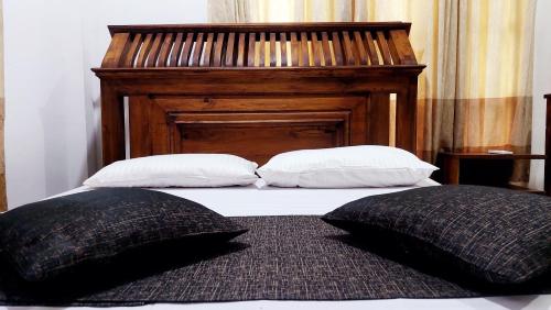 מיטה או מיטות בחדר ב-Spill View Villa