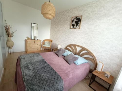 Postel nebo postele na pokoji v ubytování Appartement design avec piscine