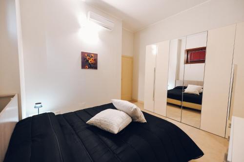 Postel nebo postele na pokoji v ubytování Verso Oriente