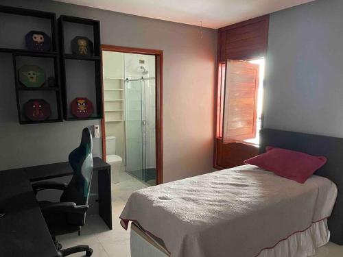 Katil atau katil-katil dalam bilik di Casa Recanto dos Pássaros