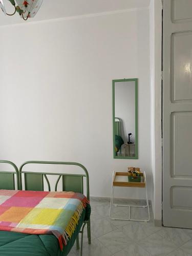 Una cama o camas en una habitación de NICE - camere con bagno privato