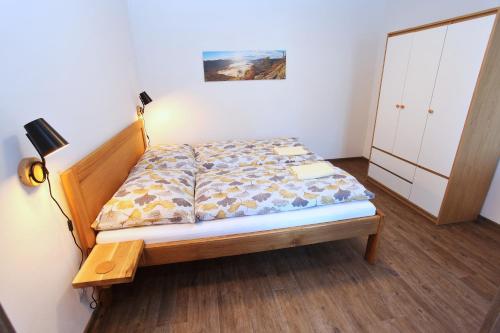 Postel nebo postele na pokoji v ubytování Apartmány Lipno-Hory