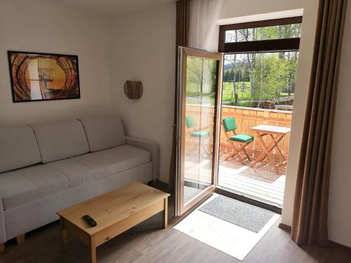 Posezení v ubytování Apartmány Lipno-Hory