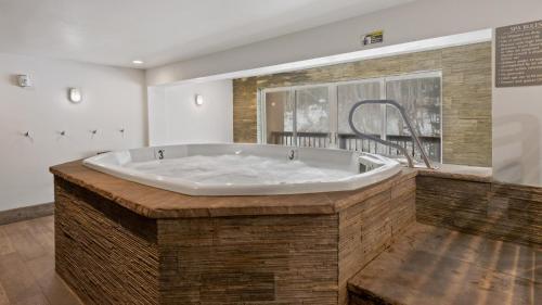 a large bath tub in a room with at Chalet Fescue in Vail