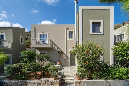 a villa with a view of a building at Blue View Villas in Stalida