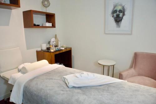 Кровать или кровати в номере Casa Cuarzo Hotel Boutique
