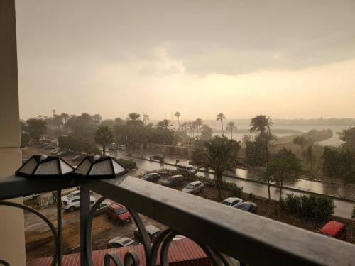 a view from a balcony of a parking lot at القاهره ركن حلوان شارع الشهيد in ‘Ezbet el-Auqât