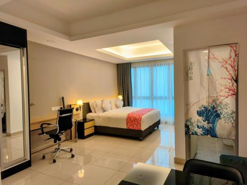 En eller flere senge i et værelse på Genting Peak 4PaxStudio420R at Grand Ion Delemen