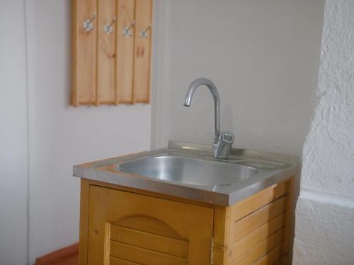 a sink in a room with a counter top at Guesthouse Alakol in Karakol