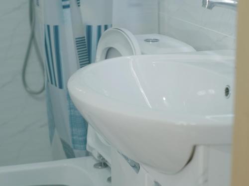 Koupelna v ubytování Guesthouse Alakol