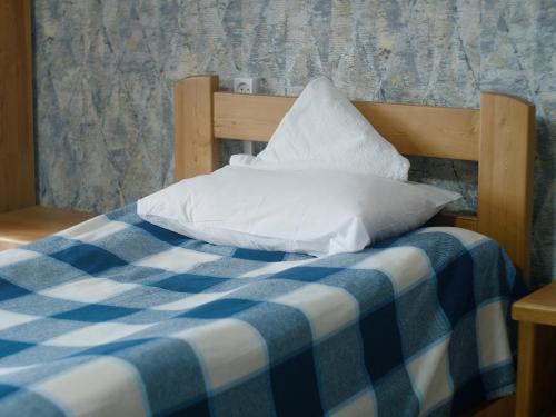 Postel nebo postele na pokoji v ubytování Guesthouse Alakol