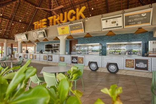 a fast food restaurant with a food truck at Bahia Principe Grand Tulum - All Inclusive in Akumal