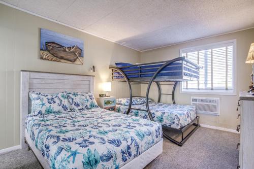 a bedroom with a twin bed and a bunk bed at Cozy Ocean City Condo Steps to Maryland Beach! in Ocean City