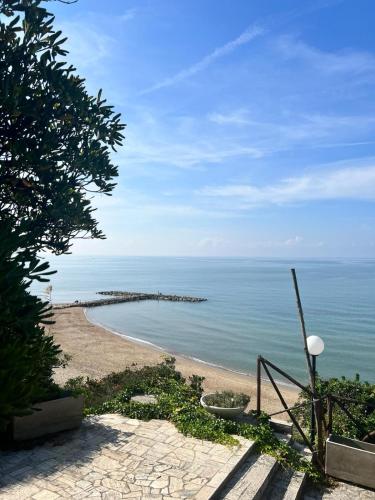 a view of a beach with the ocean at Wyndcliffe in Anzio