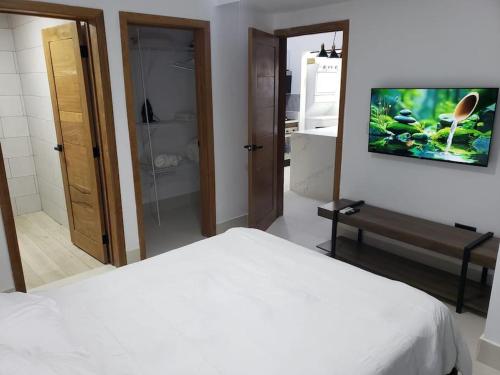 Een bed of bedden in een kamer bij Beautiful apartment in Santo Domingo