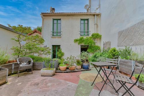 Photo de la galerie de l'établissement Charmante maison de ville proche métro et à 15 minutes du centre de Paris, à Montreuil